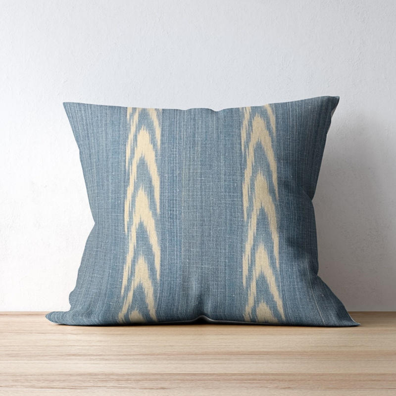Alcadena Sky Blue by Teixits Riera on a throw pillow